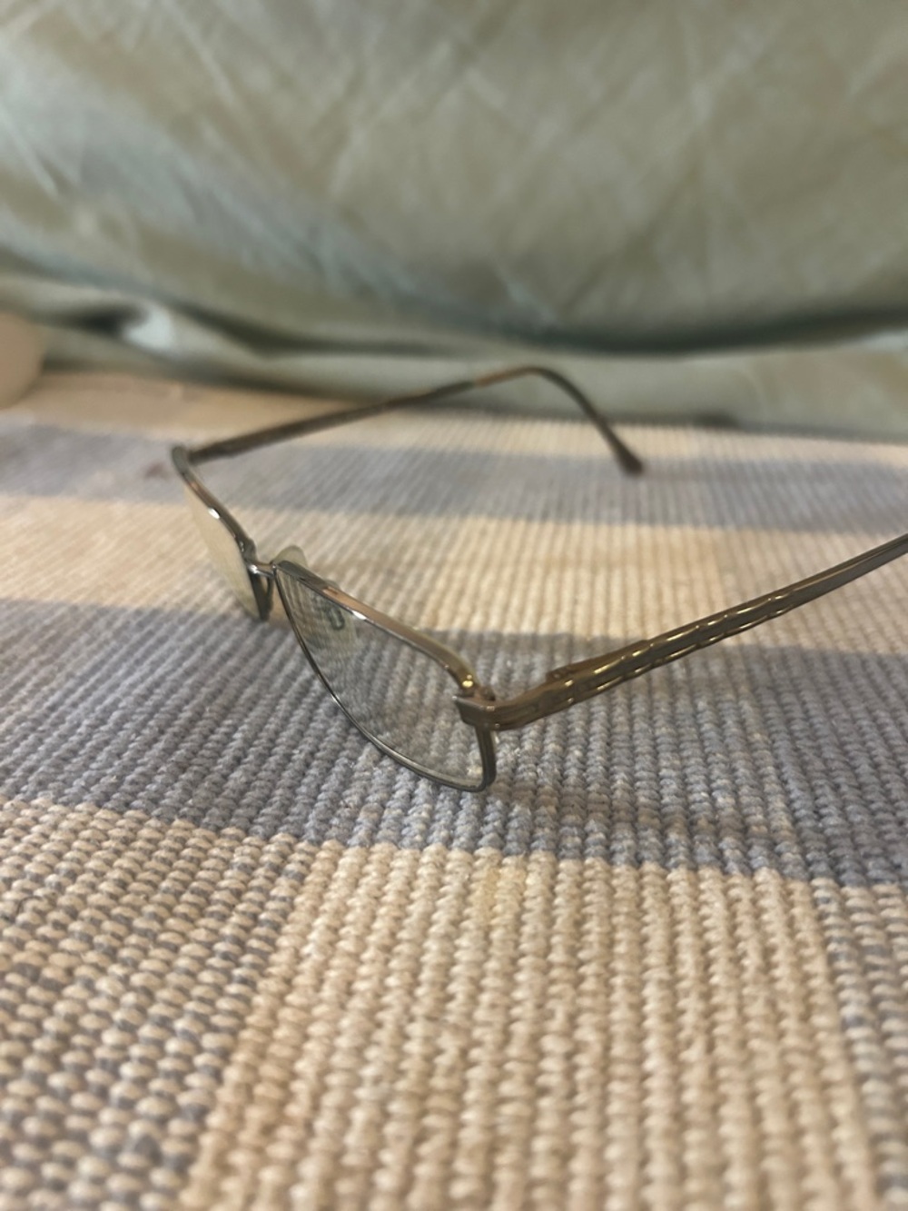 luxotica slim Metal Frameless Eyeglasses in Gunmetal